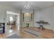 Open-concept living area with hardwood floors, built-in shelves and piano at 3357 Saddle Club Rd, Greenwood, IN 46143