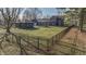 View of the property with fenced yard, and multiple structures at 3357 Saddle Club Rd, Greenwood, IN 46143