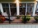 Well-appointed sun room featuring comfortable seating, flowers, and exterior view at 3727 Tributary Ct, Westfield, IN 46062