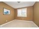 Neutral bedroom with carpet, a window, artwork and warm-toned paint at 3727 Tributary Ct, Westfield, IN 46062