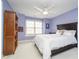 A charming bedroom features a ceiling fan, lots of natural light, and a bookcase at 3727 Tributary Ct, Westfield, IN 46062