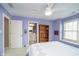 A cozy bedroom is accessible to a walk-in closet and an attached bathroom at 3727 Tributary Ct, Westfield, IN 46062
