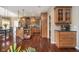 A spacious kitchen with custom cabinets, a large island and hardwood floors at 3727 Tributary Ct, Westfield, IN 46062