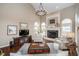 Spacious living room with a fireplace, comfortable seating, and hardwood floors at 3727 Tributary Ct, Westfield, IN 46062