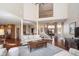 Spacious living room with hardwood floors, tall ceilings, and natural light from the foyer entrance at 3727 Tributary Ct, Westfield, IN 46062