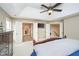 Spacious main bedroom features tray ceilings, a ceiling fan, and opens to the attached bathroom and closet areas at 3727 Tributary Ct, Westfield, IN 46062
