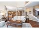 Open floorplan seamlessly connects the living room to the kitchen and staircase with hardwood floors at 3727 Tributary Ct, Westfield, IN 46062