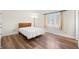 Bedroom with wood floors and bright window at 3875 Offshore Dr, Columbus, IN 47203