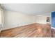 Bright, spacious living room with hardwood floors and neutral walls at 3875 Offshore Dr, Columbus, IN 47203