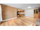 Spacious living room with wood floors and kitchen view at 3875 Offshore Dr, Columbus, IN 47203