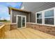 New wooden back deck with views of backyard at 4372 Pine Bluff Dr, Bargersville, IN 46106