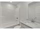 Bathroom with a shower-tub combo and a granite vanity at 4372 Pine Bluff Dr, Bargersville, IN 46106