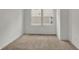 Carpeted bedroom offers a serene setting with natural light from a large window at 4372 Pine Bluff Dr, Bargersville, IN 46106