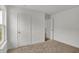 Carpeted bedroom offers bright interiors with adjacent closet and room access at 4372 Pine Bluff Dr, Bargersville, IN 46106