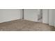 Carpeted bedroom with doorways leading to a bathroom and closet space at 4372 Pine Bluff Dr, Bargersville, IN 46106