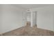 Carpeted bedroom with an open doorway view to another carpeted room at 4372 Pine Bluff Dr, Bargersville, IN 46106