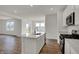 Bright, modern kitchen featuring a center island, stainless steel appliances, and recessed lighting at 4372 Pine Bluff Dr, Bargersville, IN 46106