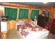 Bedroom with wood paneling, carpet, and a window at 4478 W County Road 125 S, Greencastle, IN 46135