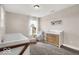 Comfortable Bedroom with a chair and white wooden dresser near a window at 4777 E Summerfield Dr, Camby, IN 46113