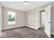 Bedroom featuring neutral walls and carpet flooring, and natural light from the window at 4777 E Summerfield Dr, Camby, IN 46113
