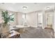 Spacious living room with natural lighting, neutral tones and relaxing features at 4777 E Summerfield Dr, Camby, IN 46113