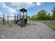 Community playground featuring a slide, climbing structures, and a swing set at 5210 Cartland Dr, Indianapolis, IN 46239