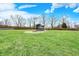Large backyard view of this home with a gazebo and fire pit on the property at 5371 Lue Ann Ln, Mooresville, IN 46158