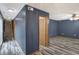 Spacious hallway with staircase access and natural light, providing seamless transition to other rooms in the home at 5371 Lue Ann Ln, Mooresville, IN 46158