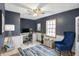 Stylish home office featuring a modern desk, comfortable chair, ample storage, and natural light, perfect for productivity at 5371 Lue Ann Ln, Mooresville, IN 46158