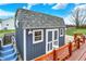 Small blue building with stairs and a star decoration on the side in the backyard at 5371 Lue Ann Ln, Mooresville, IN 46158