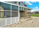 Back patio and partial view of the backyard of this home surrounded by gravel at 5371 Lue Ann Ln, Mooresville, IN 46158