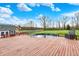 Back deck and above ground pool provide homeowners outdoor entertaining options at 5371 Lue Ann Ln, Mooresville, IN 46158