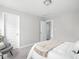 Cozy bedroom featuring a comfortable bed, decorative pillows, and stylish accents at 5832 Lyster Ln, Indianapolis, IN 46239