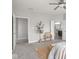 Spacious bedroom with a view of the ensuite bathroom, natural light, and simple decor at 5832 Lyster Ln, Indianapolis, IN 46239