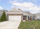 Charming single-Gathering home with brick facade, well-manicured lawn, and inviting front porch at 5832 Lyster Ln, Indianapolis, IN 46239