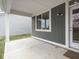 Covered patio area showcasing durable concrete flooring and an inviting outdoor space at 5832 Lyster Ln, Indianapolis, IN 46239