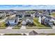 Overhead shot of a neighborhood featuring diverse home designs, well-maintained yards, and orderly streets at 6075 Meadowview Dr, Whitestown, IN 46075