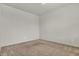 Empty bedroom with neutral carpet, light gray walls, and base trim at 6075 Meadowview Dr, Whitestown, IN 46075
