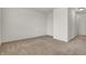 A clean, empty bedroom featuring neutral carpet, white walls, and ample space at 6075 Meadowview Dr, Whitestown, IN 46075
