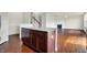 An open concept layout connects the kitchen and living room, ideal for gatherings at 6075 Meadowview Dr, Whitestown, IN 46075
