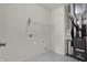 Functional laundry room with overhead shelving and modern appliances at 6075 Meadowview Dr, Whitestown, IN 46075