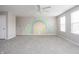 Bedroom with a rainbow mural on the wall, ceiling fan, and plush carpet flooring at 6345 Meadowview Dr, Whitestown, IN 46075