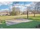Outdoor basketball court on a grassy area in a community with residential homes at 6516 Shamel Dr, Indianapolis, IN 46278