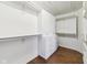 Walk-in closet with custom shelving and drawers, offering ample storage space at 6516 Shamel Dr, Indianapolis, IN 46278