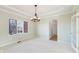 Spacious dining area features modern lighting and recessed ceiling at 6516 Shamel Dr, Indianapolis, IN 46278