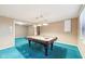 Well-lit game room featuring a classic billiard table and a three-lamp fixture at 6516 Shamel Dr, Indianapolis, IN 46278