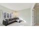 Bright living room with a comfortable sectional sofa with decorative pillows at 6516 Shamel Dr, Indianapolis, IN 46278