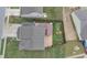 Birds eye view of a home, showcasing roof, patio, fenced yard, and surrounding neighborhood at 7517 Heben Dr, Indianapolis, IN 46113
