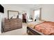 Bedroom with dresser, vanity, closet and window at 7517 Heben Dr, Indianapolis, IN 46113