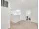 Hallway with carpet leading to laundry room with washer and dryer at 7517 Heben Dr, Indianapolis, IN 46113